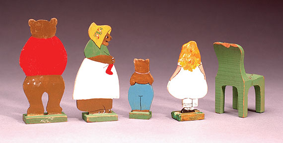 Back side of painted three bears and Goldilocks painted toys